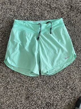Nike Women's Light Mint Athletic Running Shorts with Black Drawstring